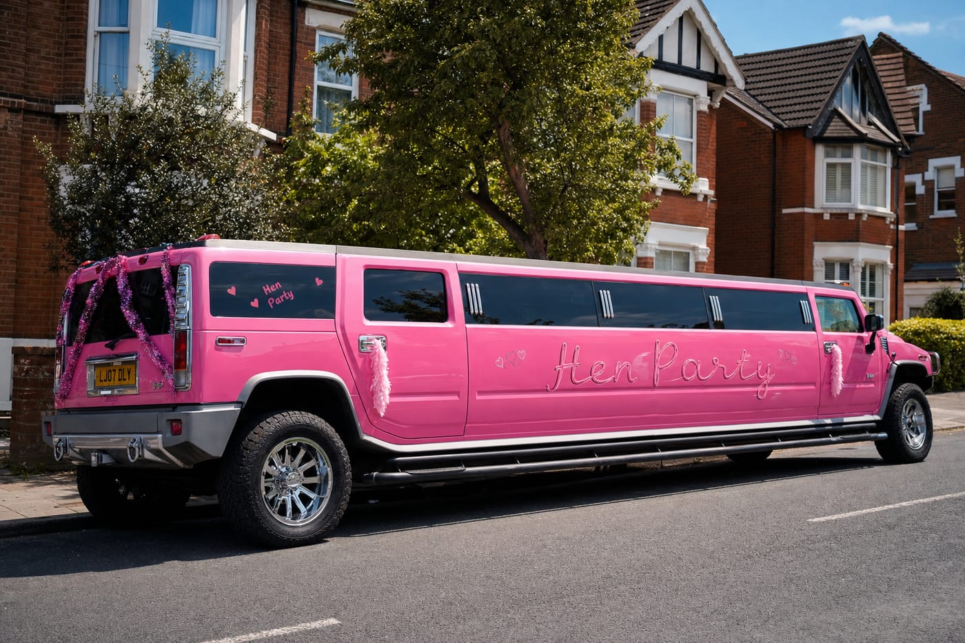 Pink Hummer stretch limousine, side view