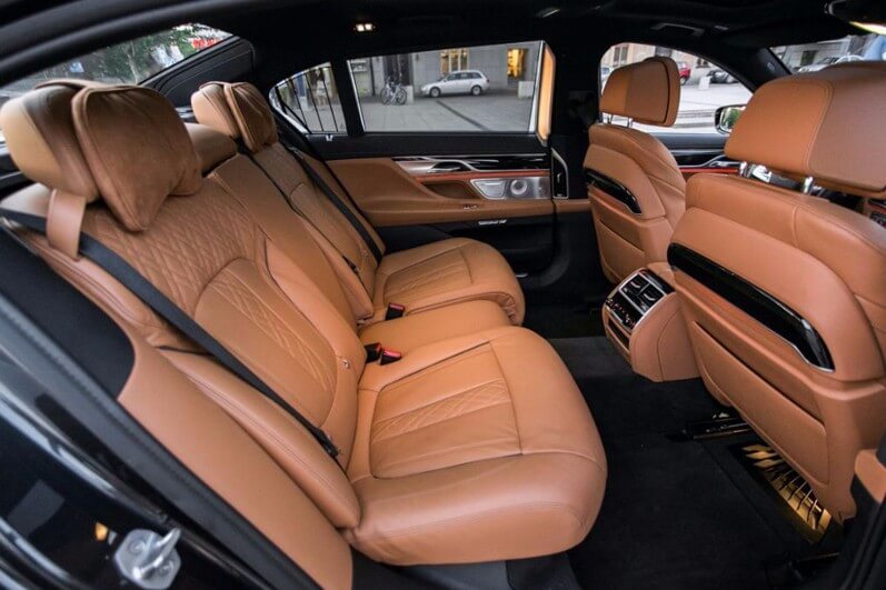 BMW 7 Series rear cabin with tan leather seats