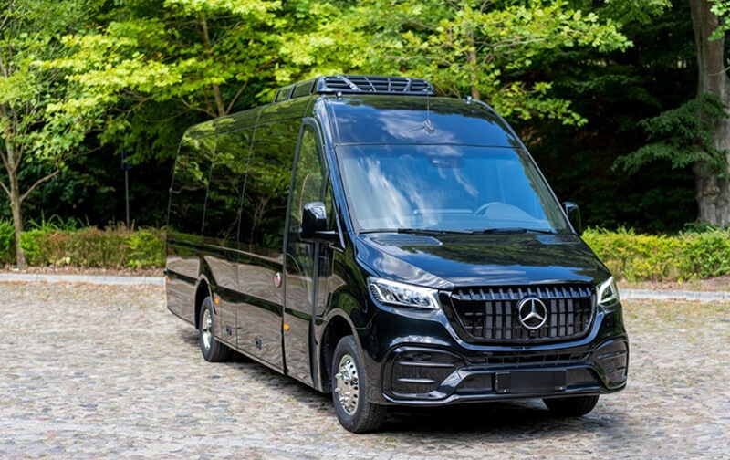 Black executive Mercedes-Benz Sprinter, front view